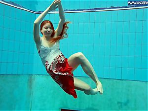 super hot grind redhead swimming in the pool